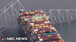 View from the air of the collapsed bridge and the cargo ship