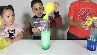 BAKING SODA AND VINEGAR SCIENCE EXPERIMENT - WATCH THE BALLOONS BLOW UP!