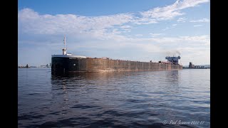 0.189394 mile long ship! The American Century Departing Duluth with Coal  The Pier is 0.33 mile.