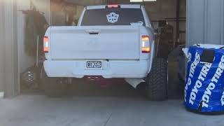 Clapped out 5th gen Cummins on 26x16s and 3 inch spacers!