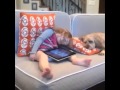 Little sleepy girl wake up with dog