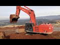 hitachi zaxis 670lcr excavator loading mercedes and man trucks by anogiatis