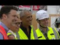 Obama surprises construction workers at presidential center site