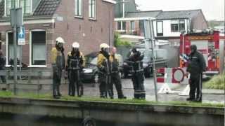 Zoekactie persoon na te water geraakte scooter aan de Zomervaart in Haarlem