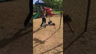 Boy Enjoys His Time While Spinning on a Swing