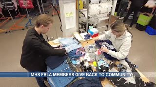 Mandan High School FBLA student organization gives back to community through clothes