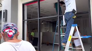 Commercial storefront Removal #glassfactory tours. pull out storefront frame and glass.