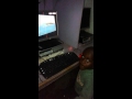 dj benito playing with computer game