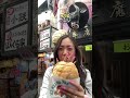 eating street food at dotonbori in osaka japan shorts