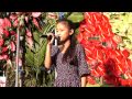 Mizo girl accepts anthurium flower as she sings: Festival amidst Nature