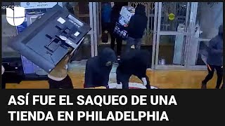 En video: encapuchados irrumpen a martillazos y saquean una tienda