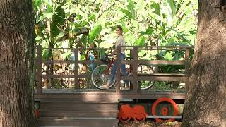 Evelyn cycling in Nantou, following the train track from Jiji Station to Checheng