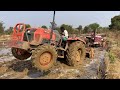 mahindra tractor stuck in mud pulling out by kubota tractor tractor