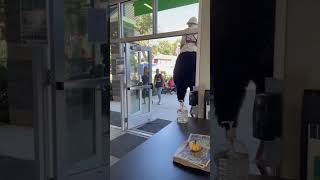 Guy Wearing Halloween Costume Rides Ostrich at Fair