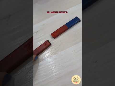 Why do opposite poles of a magnet attract each other?