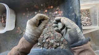 Thousands of coins to sort from metal detecting.