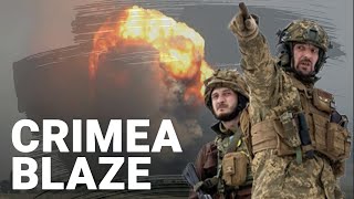 Thousands flee as fire engulfs military base in Crimea