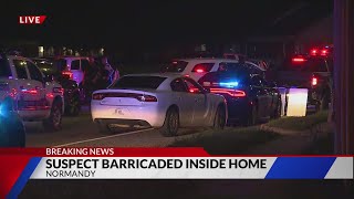 Normandy Police request backup for barricaded suspect in home