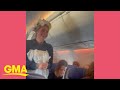 Bride-to-be walks down the aisle mid-flight in toilet paper dress