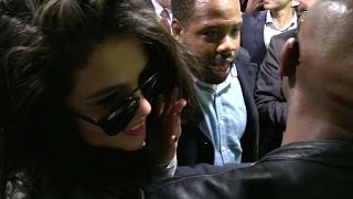 CRAZY - SELENA GOMEZ gets TRAPPED and CRUSHED by FANS in Paris