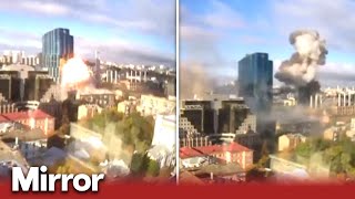 Moment two Russian missiles strike Kyiv city centre in huge blast