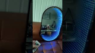 Oval infinity mirror