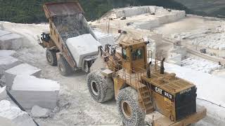 Caterpillar 992D Wheel Loader Loading Huge Marble Blocks On Caterpillar 775E Dumper