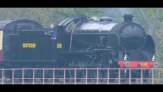 Watercress Line Autumn Steam Gala 2022. LSWR Urie S15 4-6-0 with through freight at Ropley Station.