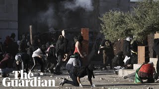 Scores injured as Palestinians and Israeli security forces clash at al-Aqsa mosque