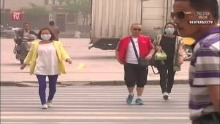 Sandstorm, wildfire rage parts of Northwest China