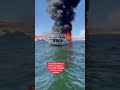 A family houseboat goes up in flames in Lake Powell in the USA