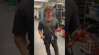 Attaching to a climbing rope using a carabiner