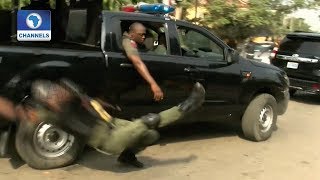 Video: Jubilating Policeman Falls Off Moving Van In Lagos
