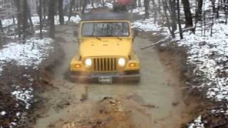 Jeep going through mud hole