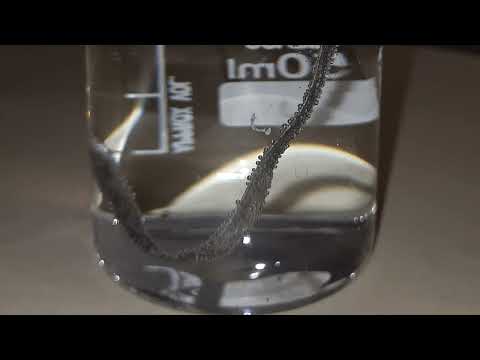What happens when magnesium reacts with boiling water?