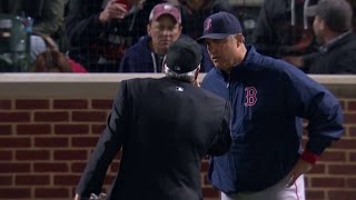 BOS@BAL: Umpire takes ball from Ogando, examines it