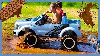 Unboxing Ride on Cars - Power Wheels Ford F150 Raptor Truck Rides in the Mud!
