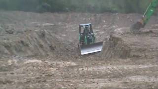 pond digging excavating in the rain