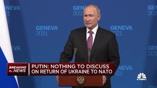 Vladimir Putin delivers remarks after meeting with President Joe Biden