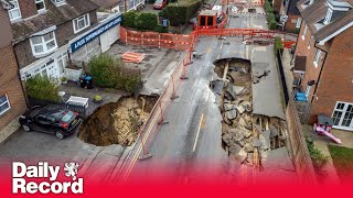 Surrey sinkhole that wrecked street could take a year to fix as residents furious at lack of clarity