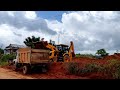 jcb loading soil in truck jcb3dxsuper