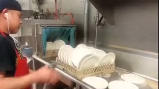 Man Washes The Dishes Quickly