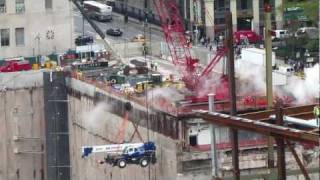 Manitowoc 14000 flying a Tadano rough terrain crane 70+ feet down