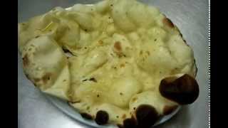 making naan bread in Tandoori Oven chicken tandoori