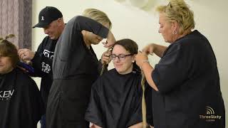 Mannville residents chop off hair to help fight cancer