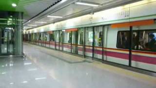 广州地铁列车开出大学城北站 A Guangzhou Metro train departs from HEMC North Station