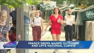 France drops masks outdoors and lifts national curfew