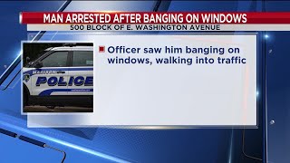 Man arrested after banging on windows, walking into traffic in Madison