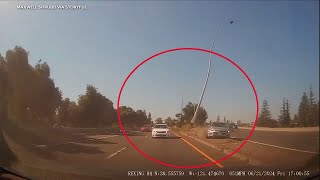 Streetlight snaps off, flies through air during crash on NorCal highway