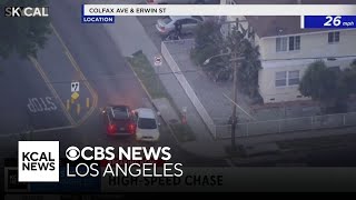 Pursuit suspect crashes into car, runs away